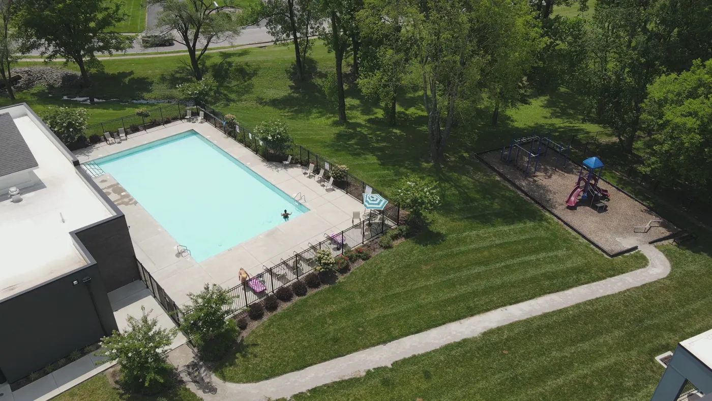The resort-style pool at The Bend in use on a summer afternoon